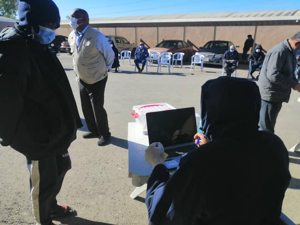 Distribution of food aid to low-income and needy families in Al-Zawiyah city