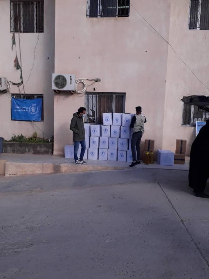 Food aid distribution in Al-Zawiyah city