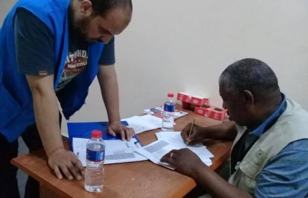 Food aid distribution in Az-Zawiyah city