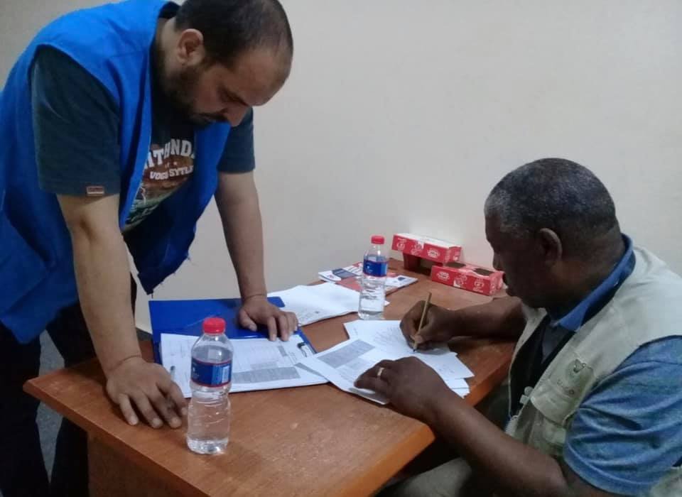 Food aid distribution in Az-Zawiyah city